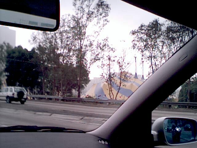 partly obscured blue and 
yellow tent(s).